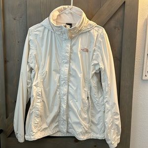 White The North Face rain jacket.